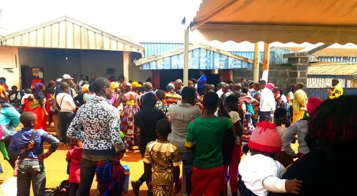 A crowd gathered outside the clinic building