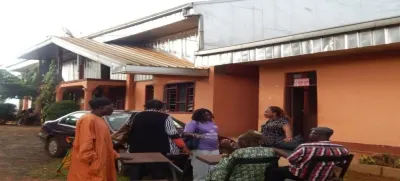 Patients and volunteers gathered outside the Dschang District Hospital