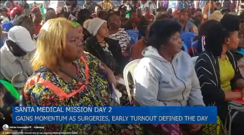 Patients seated in a crowded hall on the second day of the mission